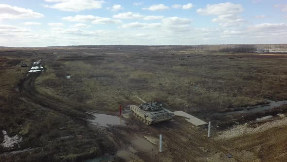 Aerial view of tank firing at military training area, Russia