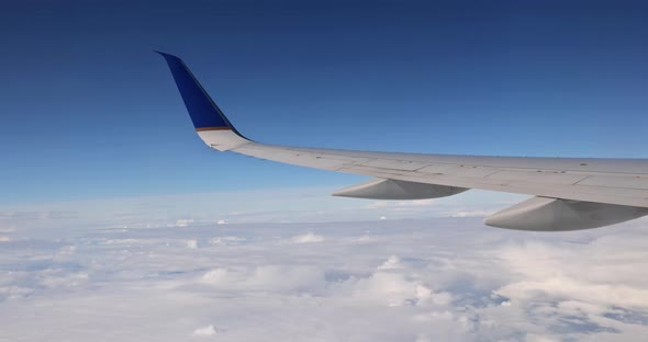 Amazing Skyline View From Airplane Sky Above the Clouds