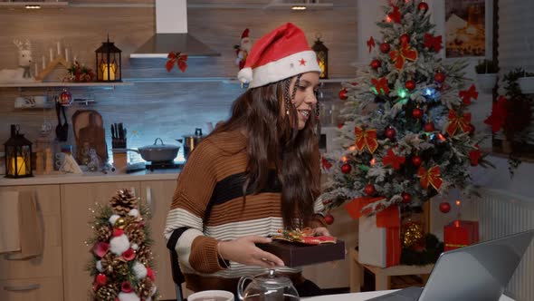 Caucasian Woman Giving Gifts on Video Call Technology