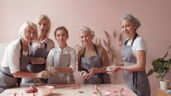 Female Ceramists Team in Pottery Workshop