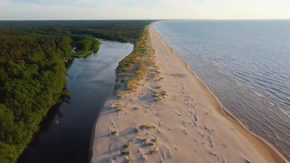 Irbe River Meets Baltic Sea in Latvia Aerial Dron 4K Shot.