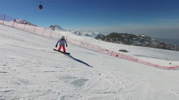 Woman Snowboarding