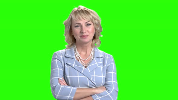 Pretty Mature Woman Smiling on Green Screen.