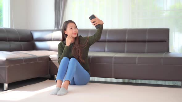 Young asian woman use smart phone