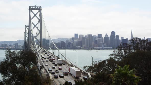 Static shot of Oakland Bay Bridge and cityscape view of San Francisco, California