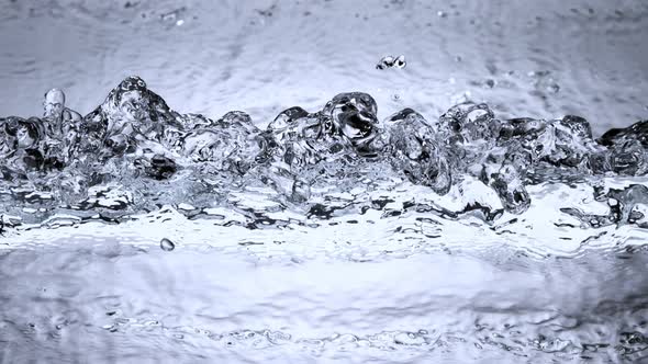 Super Slow Motion Shot of Crashing Two Water Waves and Making Linear Splash at 1000Fps