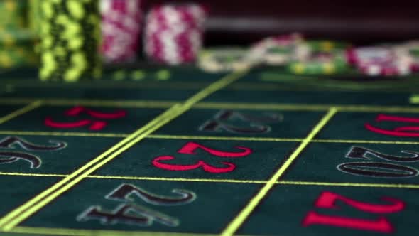 Gambling Chips Falling Down on the Roulette Table, Slow Motion