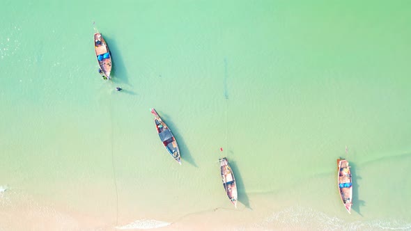 4K aerial view from drone. Fishermen's boats at the beach,