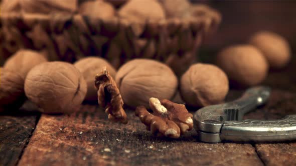 Super Slow Motion of Walnut Grains Fall on the Table