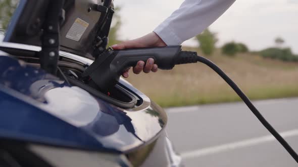 Close Up View of a Charging Electric Car
