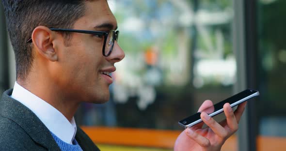 Businessman talking on mobile phone