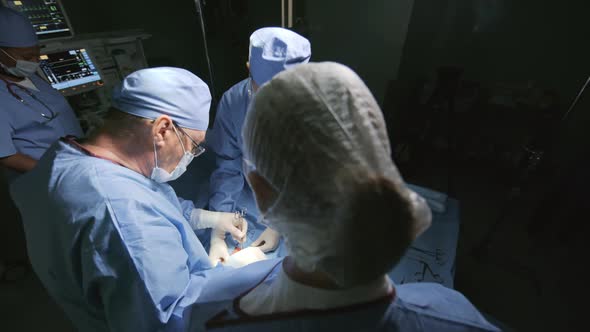 Team of Surgeons Saving Life