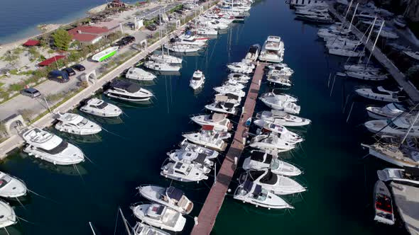 Drone  Aerial of the Marina with Yachts Near the Mountains