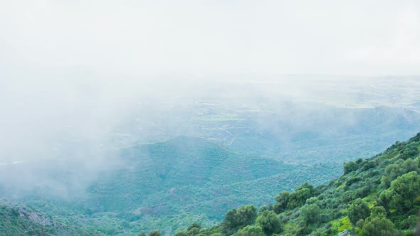 Mist Covering Mountain Peaks. Global Warming, Climate Change. Weather Forecast