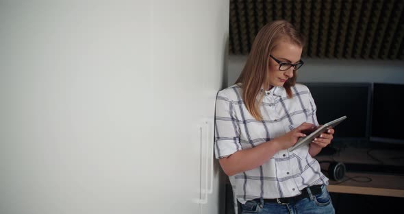 Businesswoman Using Wireless Computer At Workplace