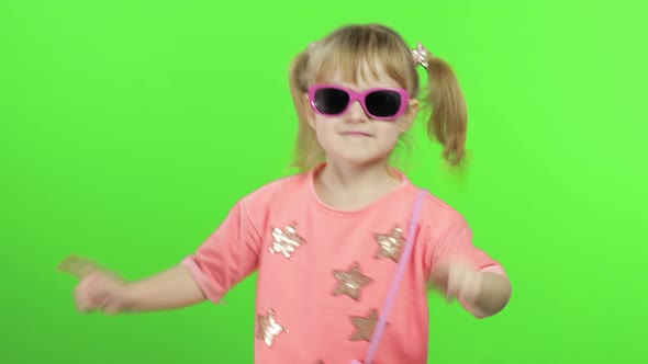 Positive Girl in Pink Blouse and Sunglasses Dancing and Posing. Chroma Key