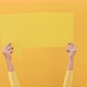 Woman hands holding speech bubble with empty space for text on yellow background - VideoHive Item for Sale