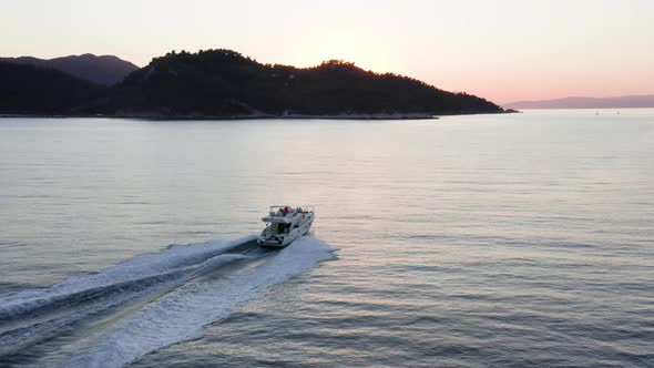 Fast moving motor yacht at the sea.