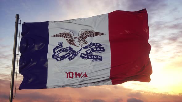 Flag of Iowa Waving in the Wind Against Deep Beautiful Sky at Sunset