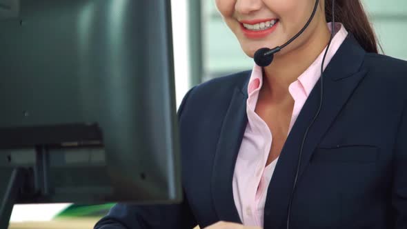 Business People Wearing Headset Working in Office