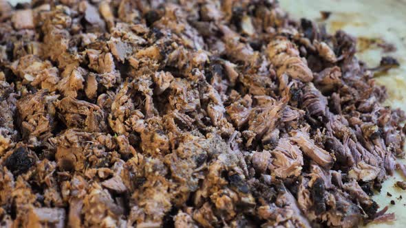 Shredded Beef Meat on Kitchen's Table, Close Up