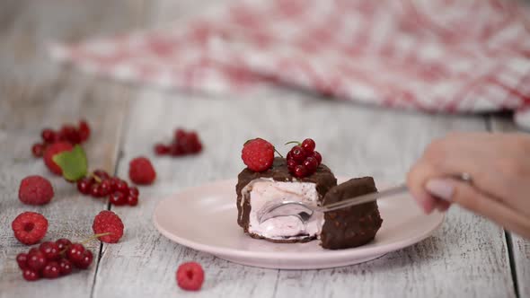 Eating Berry Ice Cream with a Spoon