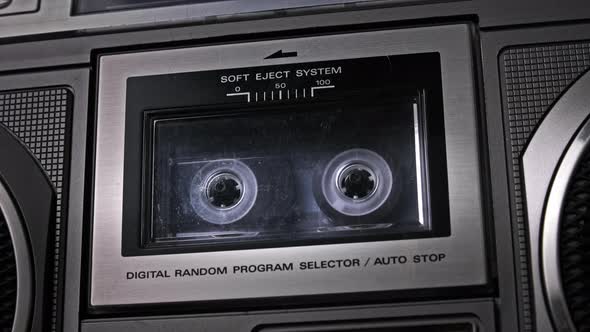 Audiocassette Rotates in Vintage Tape Recorder