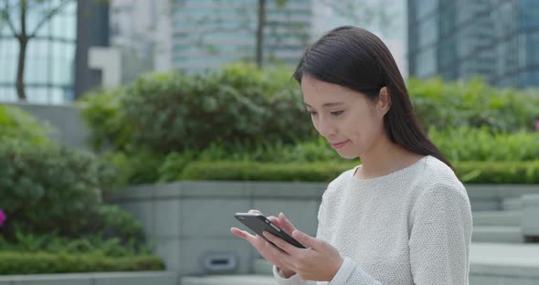 Woman use of smart phone at outdoor