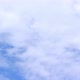Movement of cumulus continuous clouds on a blue beautiful sky, background in motion, real time - VideoHive Item for Sale