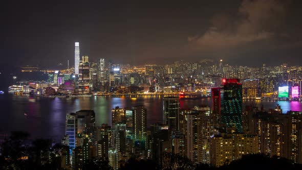 Hong Kong Urban Cityscape Aerial Skyline Panorama Timelapse at Night Pan Up