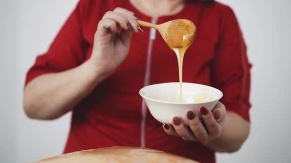 Therapist Applies Fresh Honey on Client Back To Do Massage