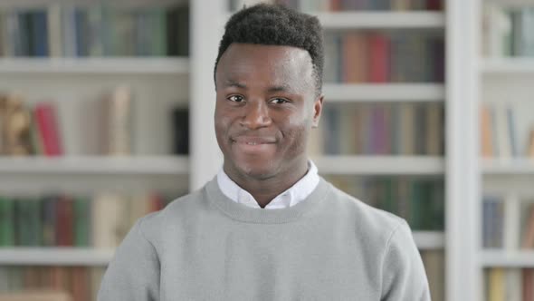 Portrait of African Man Shaking Head As Yes Sign Approval