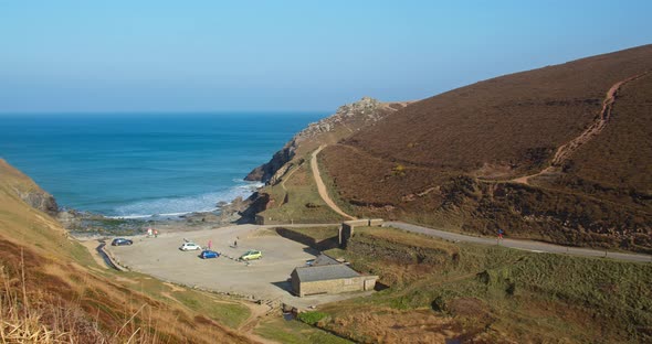Panoramic View Of Chapel Porth Beach And Carpark In North Cornwall Coast In United Kingdom. Aerial D