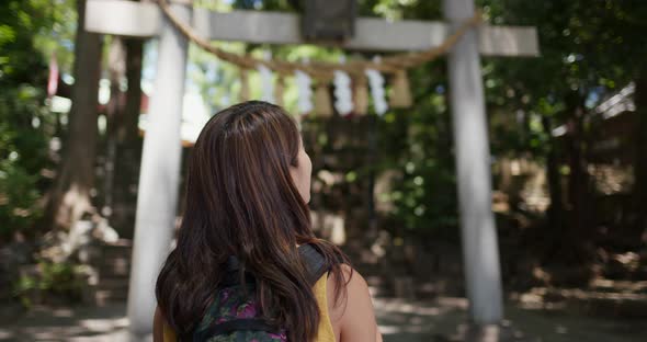 Woman Take Photo on Cellphone in Japanese Temple