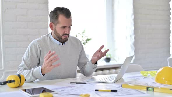 Upset Young Architect Reading To Failure at Work, Disappointment 