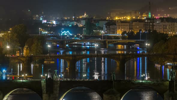 Aerial Night View of the Vltava River and Illuminated Bridges Timelapse Prague