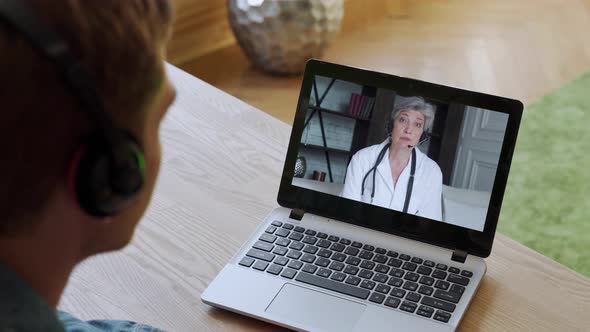 Man Having Video Conferencing Online Woman Doctor