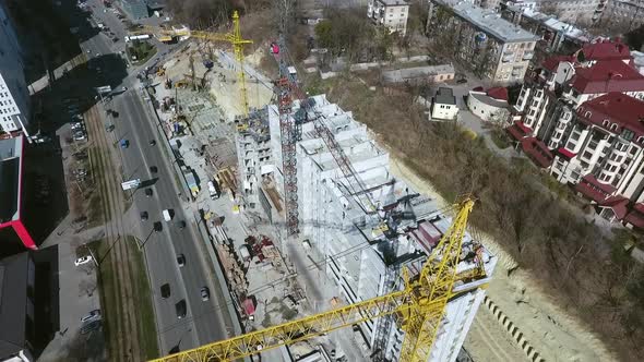 Aerial of construction site of multistory building in city center