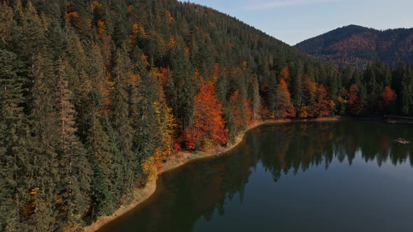 Drone Flight Along Deep and Wild Famous Alpine Lake Sinevir Surrounded Mountains Filmed Aerial