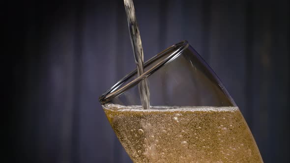 Pouring Light Beer Into a Glass