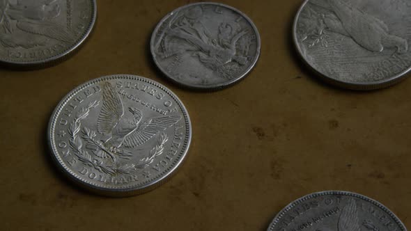 Rotating stock footage shot of antique American coins - MONEY 0069
