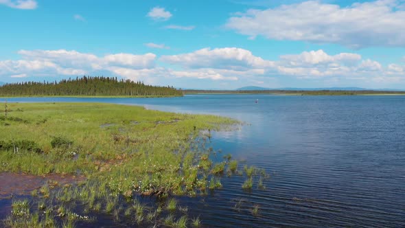 4K Drone Video of Kayaker on Clearwater Lake near Delta Junction, AK during Summer AFternoon