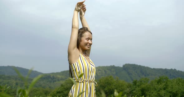 Lady in Striped Summer Dress Dances Among Tea Bushes Slow