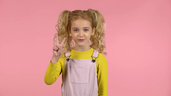Cute Little Girl Is Counting on Fingers Till Five