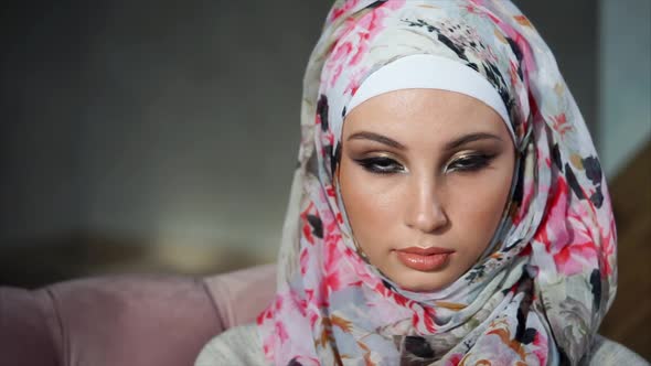 Close Up View of Attractive Muslim Woman in Bright Colorful Hijab