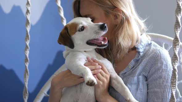 portrait of happy woman with jack russell dog