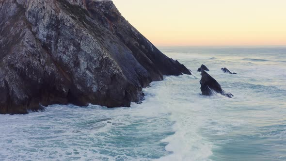 Aerial Drone View of Portugal Atlantic Coast at Lisbon, a Dramatic Rugged Rocky Coastline with Waves