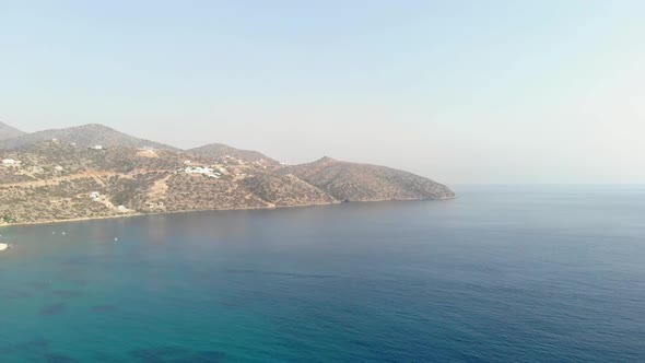 Greek Island Coast with Clear Blue Sea