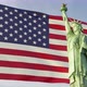 Statue of Liberty in Front of Waving American Flag 4K - VideoHive Item for Sale