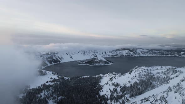 Aerial shot of Wizard Island in Crater Lake, drone shot of lake in Oregon, USA